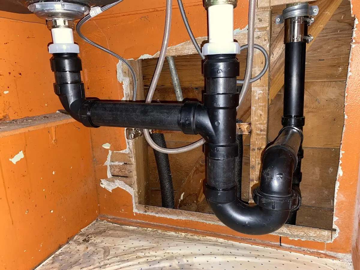 Professional Garbage Disposal Repair equipment and tools on the job in Crestwood